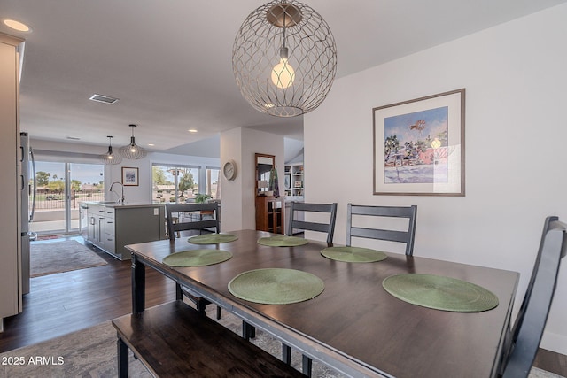 dining area with recessed lighting, dark wood-style flooring, and visible vents
