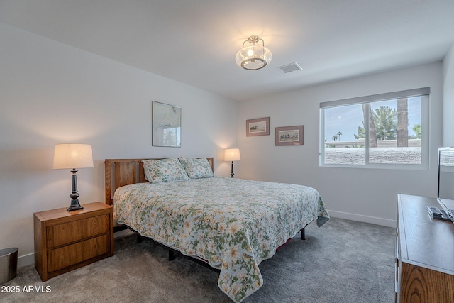 bedroom featuring visible vents, carpet flooring, and baseboards