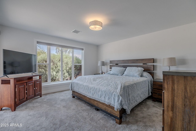 bedroom with carpet flooring and visible vents