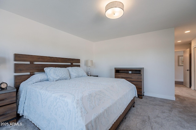 bedroom featuring recessed lighting, baseboards, and light colored carpet