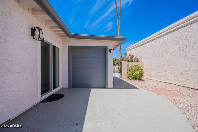 garage with fence