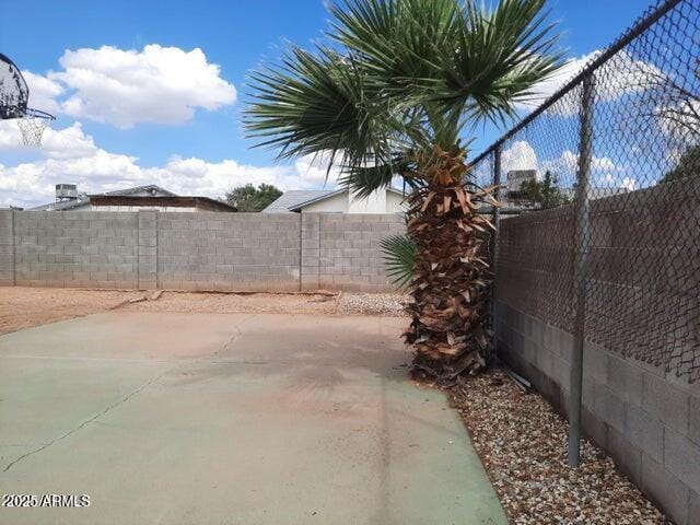 view of yard with a patio and a fenced backyard