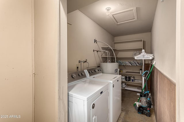 laundry room featuring washer and dryer and water heater