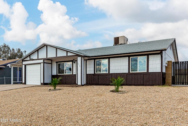 ranch-style home featuring a garage