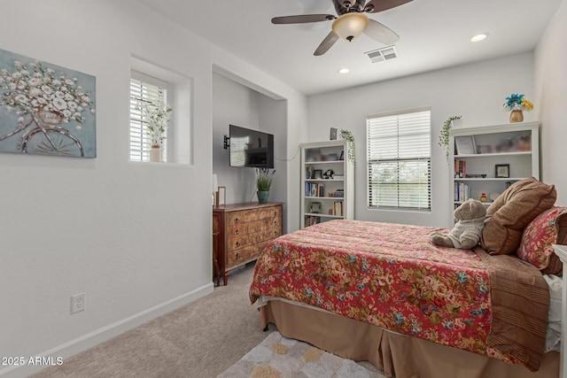 carpeted bedroom featuring ceiling fan