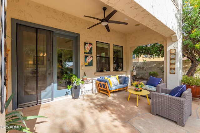 view of patio featuring ceiling fan and an outdoor hangout area