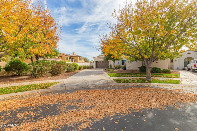 obstructed view of property featuring a garage