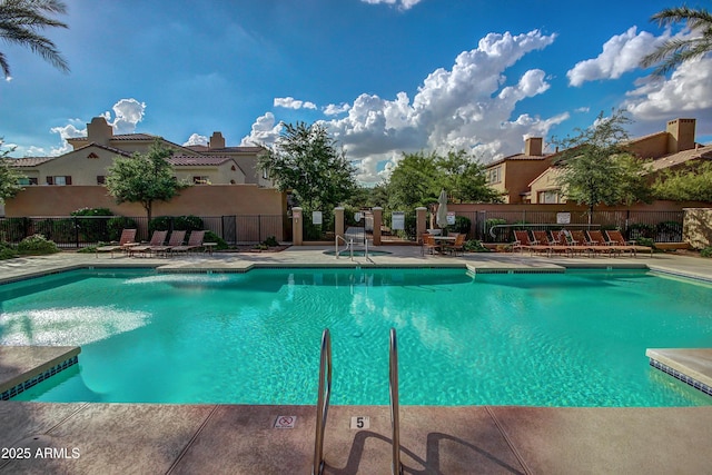 view of pool featuring a patio