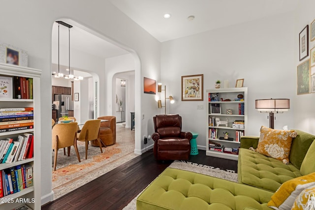 living area with dark hardwood / wood-style flooring