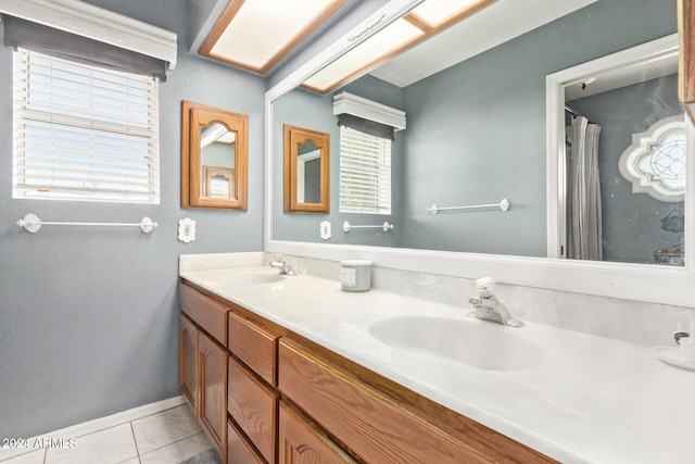 bathroom featuring vanity and tile patterned floors