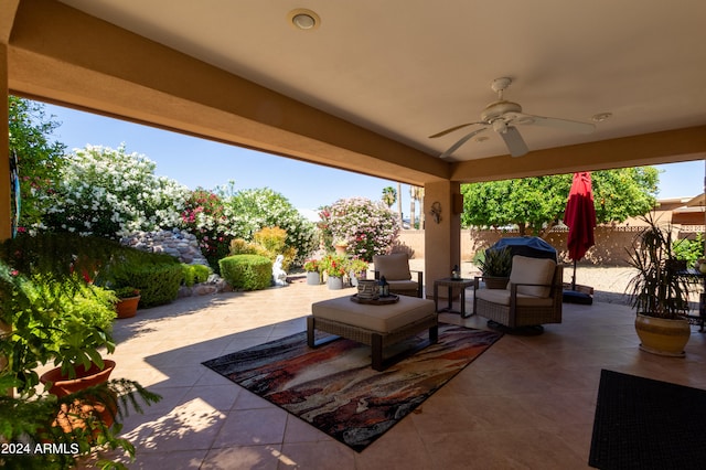 view of patio featuring ceiling fan