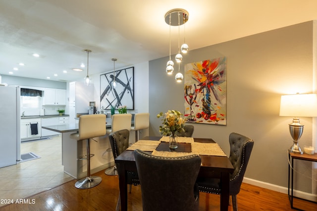 dining room featuring light hardwood / wood-style floors