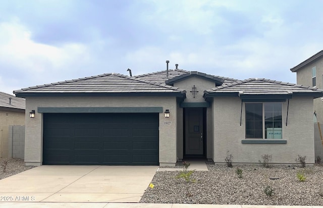 ranch-style home with a garage