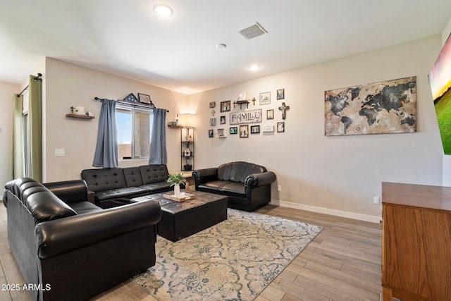 2753 E Fossil Ridge Rd, Phoenix, AZ 85050 - living room with light wood-type flooring and recessed lighting