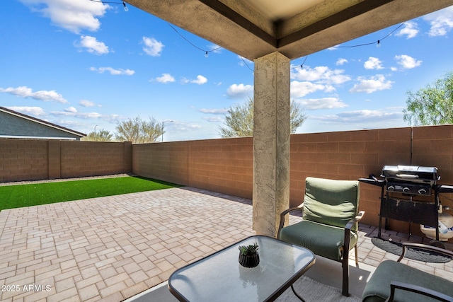 2753 E Fossil Ridge Rd, Phoenix, AZ 85050 - fenced backyard with a patio area and area for grilling