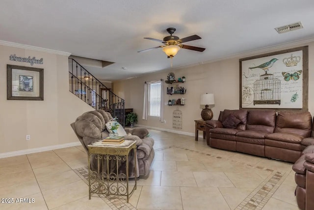 living area with light tile patterned floors, visible vents, stairs, and ornamental molding