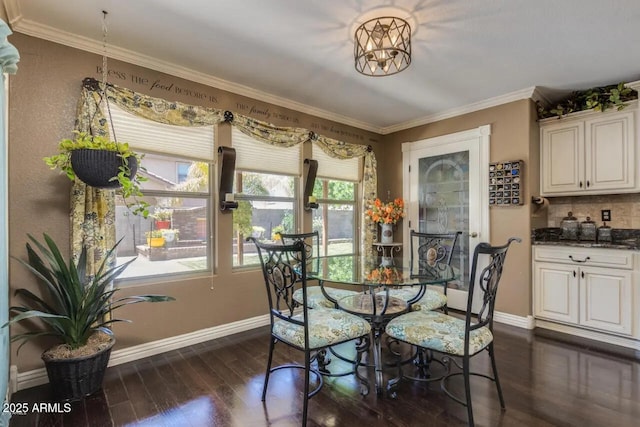 dining area with baseboards, dark wood-type flooring, and ornamental molding