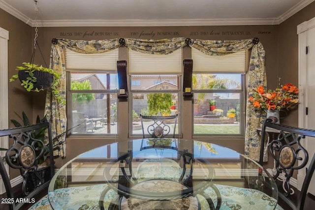 dining room with crown molding