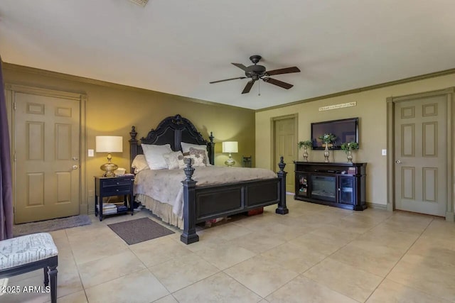 bedroom featuring ceiling fan, light tile patterned flooring, baseboards, and ornamental molding