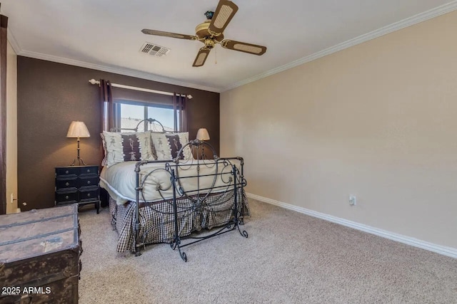 bedroom with a ceiling fan, baseboards, carpet, visible vents, and ornamental molding