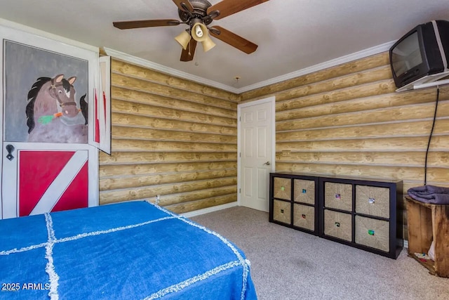 bedroom featuring ceiling fan, log walls, carpet floors, and ornamental molding