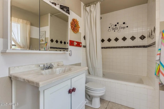 full bathroom with tiled shower / bath, toilet, vanity, and tile patterned flooring