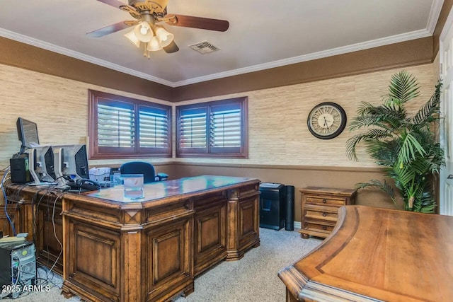 office area featuring light carpet, visible vents, crown molding, and ceiling fan