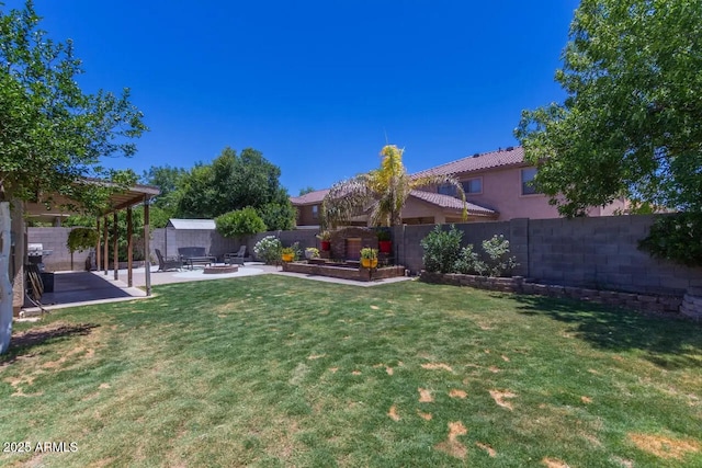 view of yard with a patio and a fenced backyard