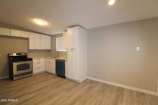 kitchen featuring white cabinetry, dishwasher, stainless steel electric range, and sink