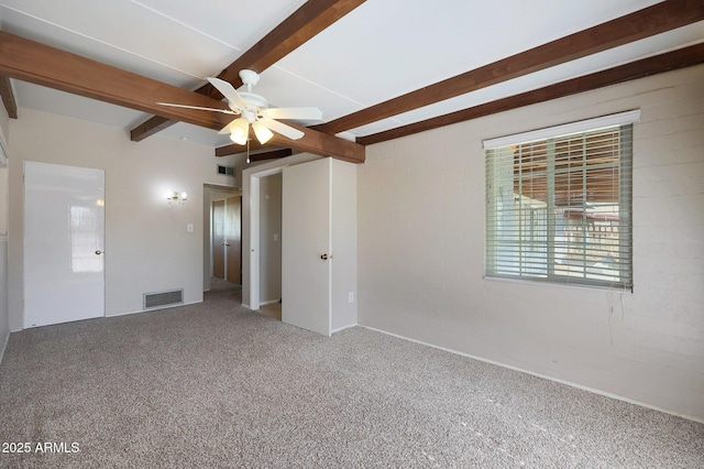 unfurnished bedroom with beamed ceiling, carpet flooring, and ceiling fan