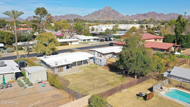 drone / aerial view featuring a mountain view