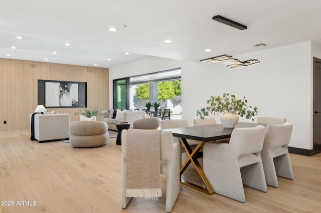 dining area with recessed lighting, visible vents, and light wood finished floors