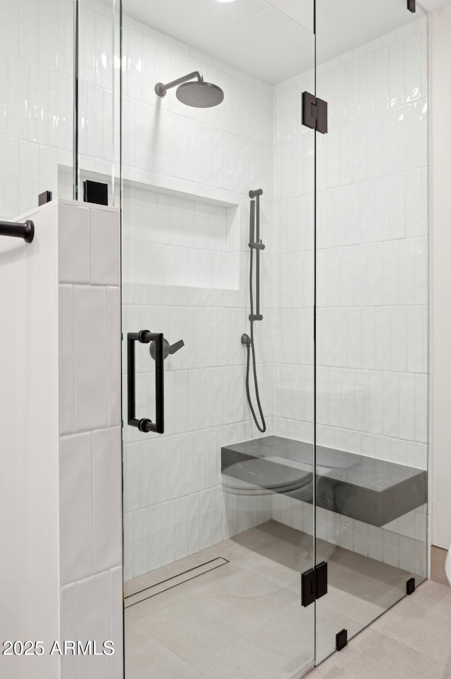 bathroom featuring a shower stall