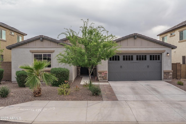 8513 N 172nd Ln, Waddell, AZ 85355 - single story home with an attached garage, concrete driveway, stucco siding, and stone siding