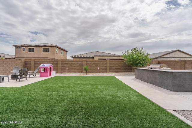 8513 N 172nd Ln, Waddell, AZ 85355 - view of yard with a patio area and a fenced backyard