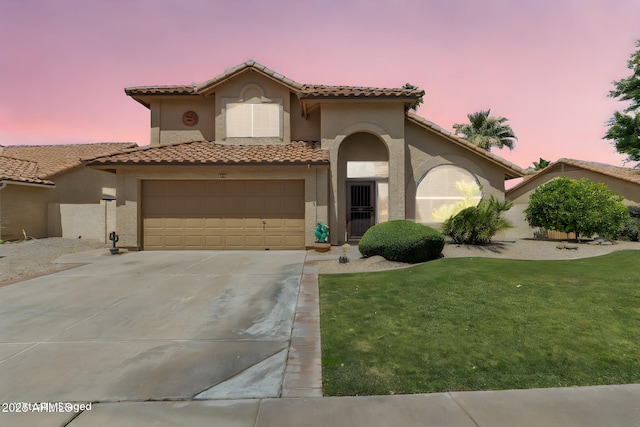 2340 W Myrtle Dr, Chandler, AZ 85248 - mediterranean / spanish-style house featuring driveway, a tile roof, a front yard, and stucco siding