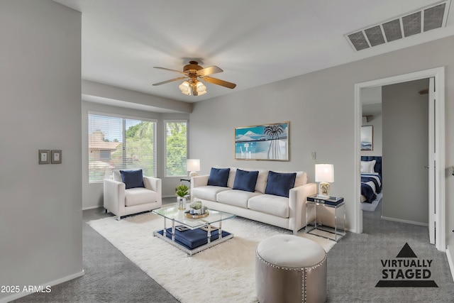 2340 W Myrtle Dr, Chandler, AZ 85248 - carpeted living room with visible vents, a ceiling fan, and baseboards