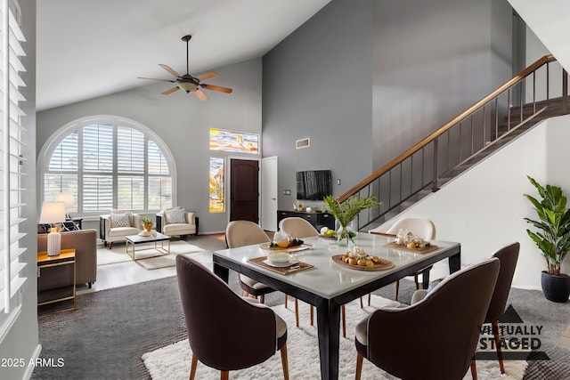 2340 W Myrtle Dr, Chandler, AZ 85248 - dining room with stairway, high vaulted ceiling, a ceiling fan, and visible vents