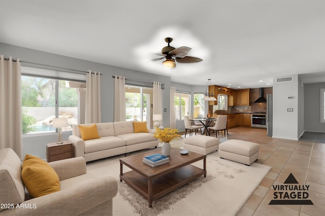 2340 W Myrtle Dr, Chandler, AZ 85248 - living area with a ceiling fan, visible vents, and light tile patterned floors