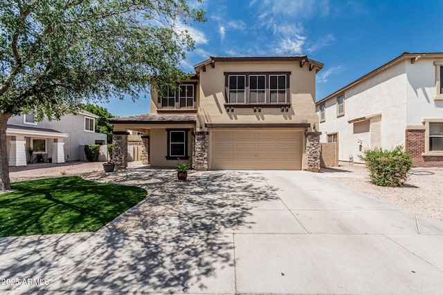 10440 E Osage Ave, Mesa, AZ 85212 - traditional-style home with stucco siding, driveway, stone siding, and an attached garage