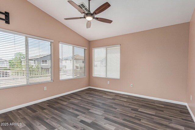 10440 E Osage Ave, Mesa, AZ 85212 - unfurnished room featuring ceiling fan, vaulted ceiling, dark wood-style flooring, and baseboards