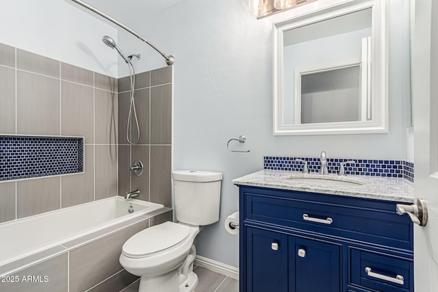 10440 E Osage Ave, Mesa, AZ 85212 - bathroom featuring vanity, washtub / shower combination, toilet, and baseboards