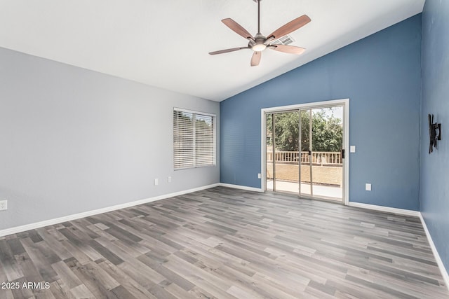 10440 E Osage Ave, Mesa, AZ 85212 - unfurnished room with a ceiling fan, wood finished floors, baseboards, and high vaulted ceiling