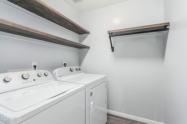 10440 E Osage Ave, Mesa, AZ 85212 - laundry area featuring separate washer and dryer, baseboards, and dark wood-style floors