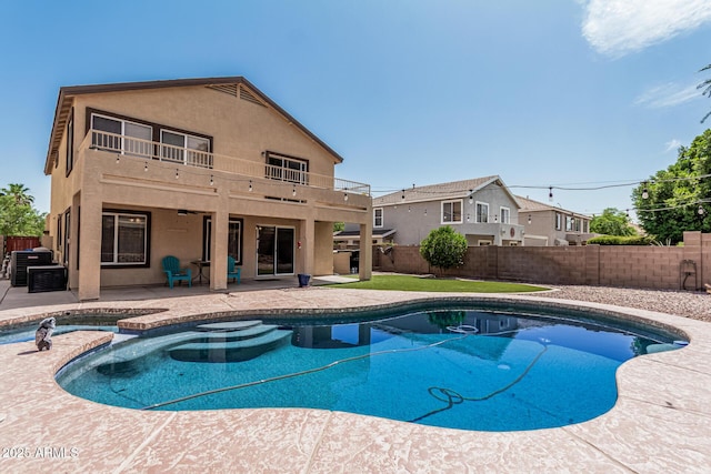 10440 E Osage Ave, Mesa, AZ 85212 - view of pool featuring a fenced backyard, a patio area, cooling unit, and a pool with connected hot tub