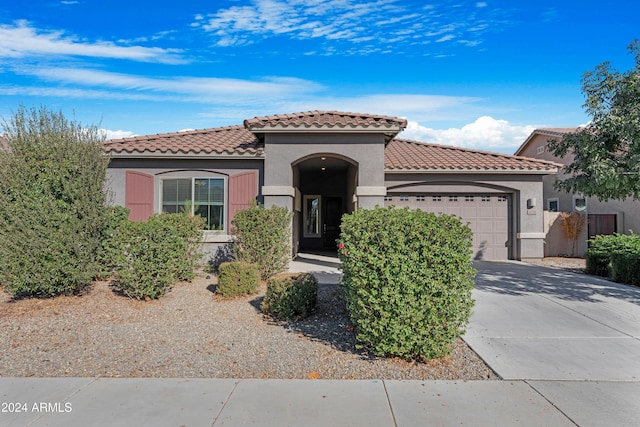 21576 E Pecan Ct, Queen Creek, AZ 85142 - mediterranean / spanish home featuring a garage