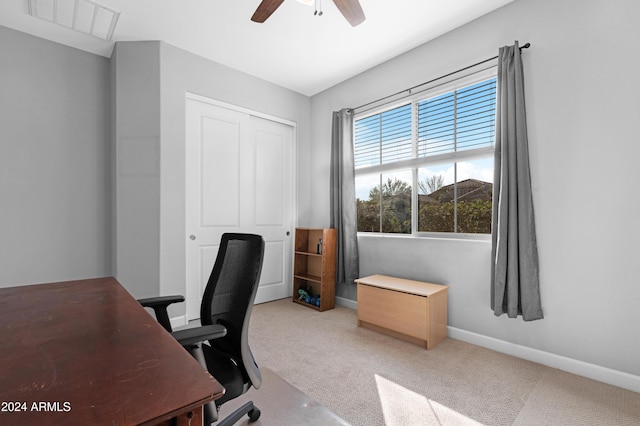 home office featuring carpet flooring and ceiling fan