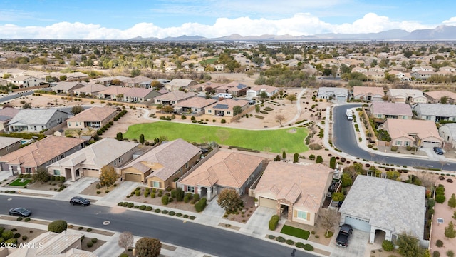 birds eye view of property with a mountain view