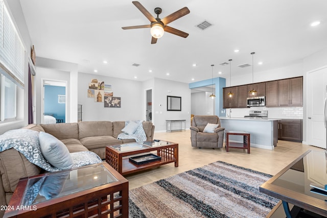 living room with ceiling fan