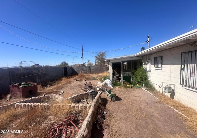 view of yard featuring fence